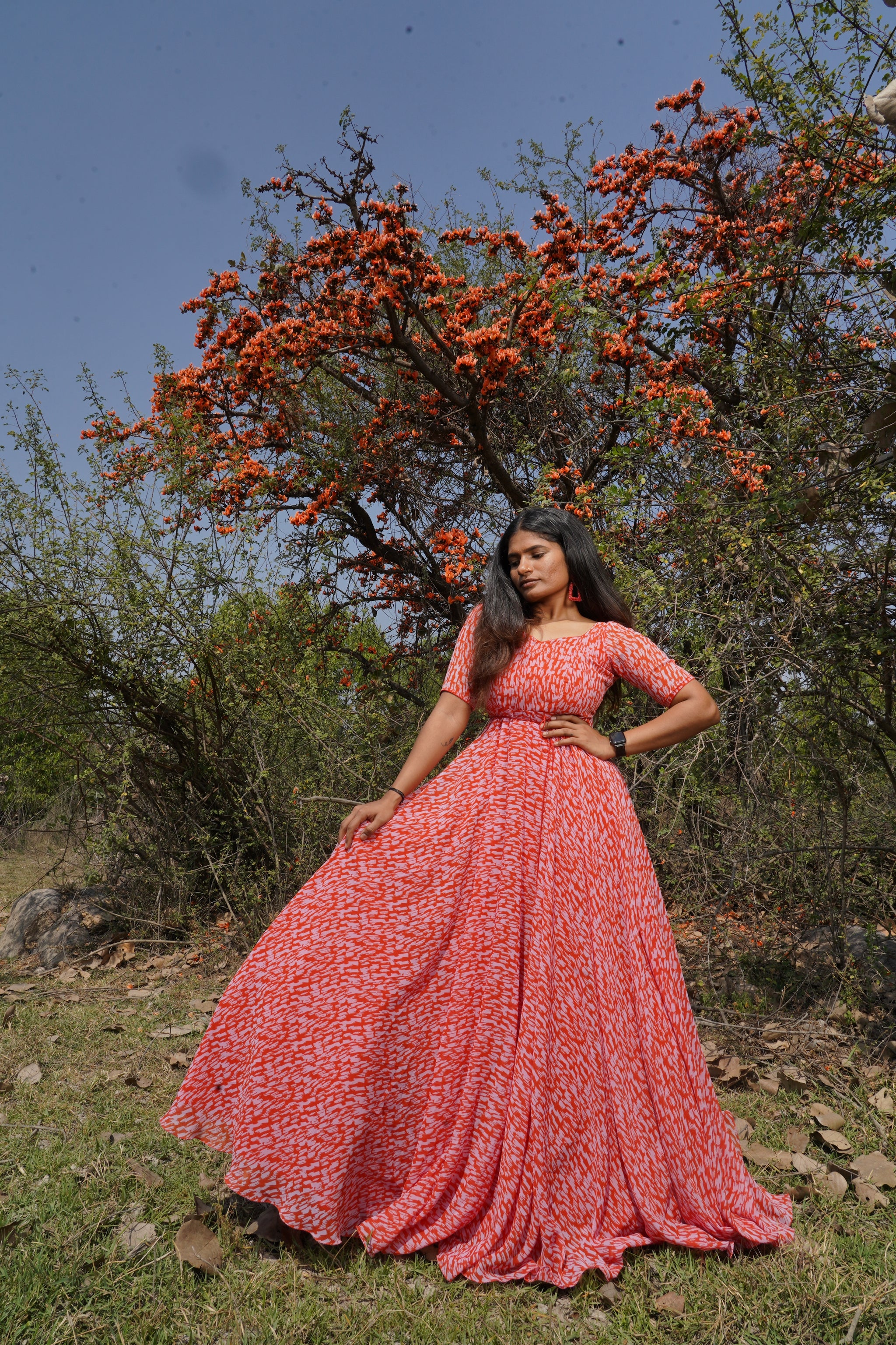 Cute Indian female model wearing blue long dress posing outdoor in daylight  pre-wedding photo shoot in terrace garden Stock Photo | Adobe Stock