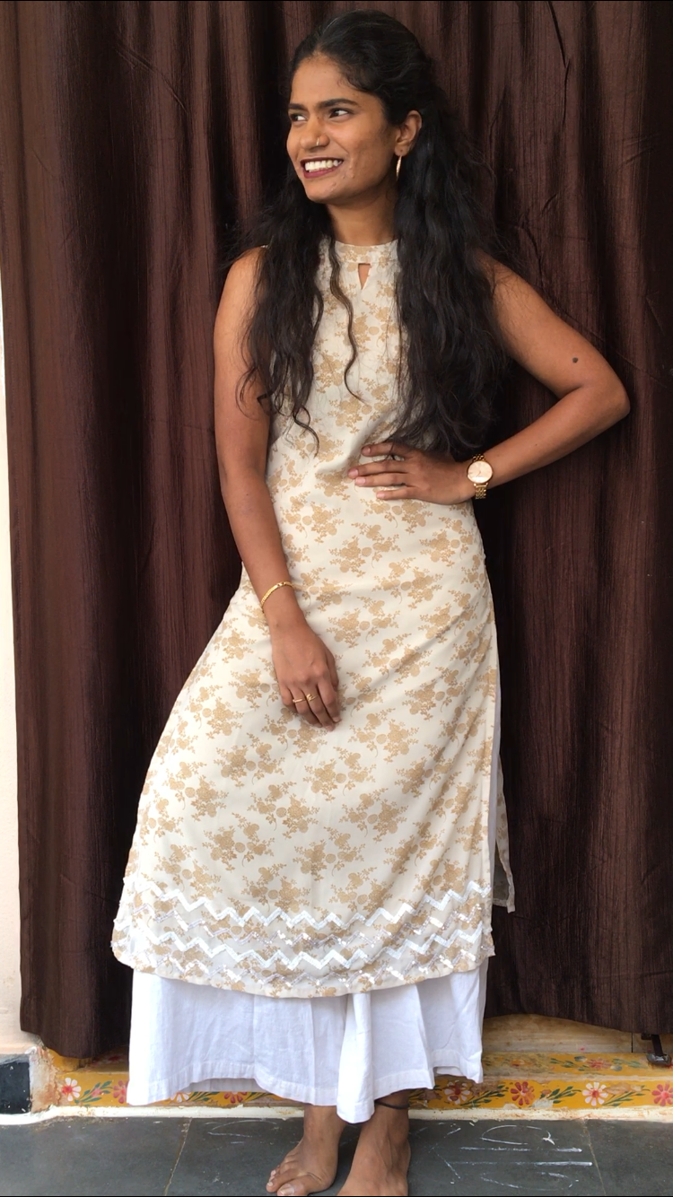 Half white high neck Kurti Navya Dachepally